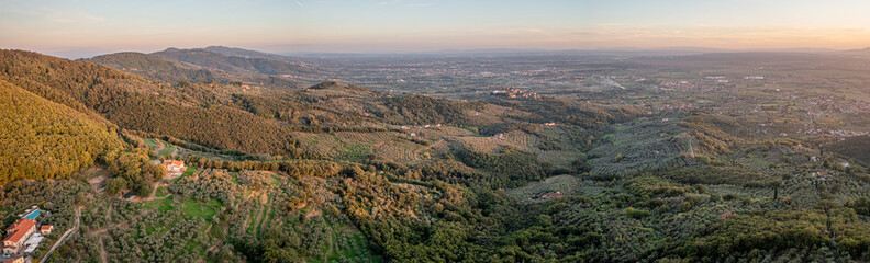 Fototapeta na wymiar Tuscany hills sunset. Beautiful aerial shot of scenic landscape
