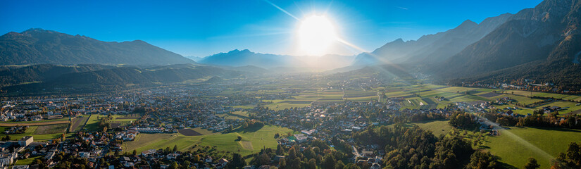 Valley of the river Inn. Hall in Tyrol close to Innsbruck. Scenic Mountain panorama - obrazy, fototapety, plakaty