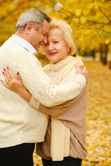 Active seniors on a walk in forest