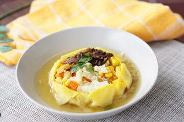 Sop Matahari is a dish from Surakarta, Central Java. This soup made from mushroom, chicken chop, carrot, corn,celery and then wrapped by fried egg added chicken stock and fried onion.
