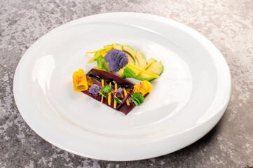Dish with avicado, broccoli and herbs. Vegan cuisine. Detox menu