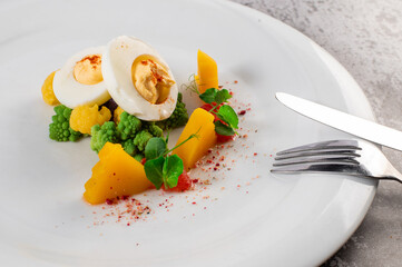 Boiled eggs with vegetables and herbs. Vegan menu. Healthy food