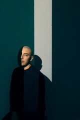 Man sitting in ray of light