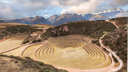 Panoramic view of Moray archeological site consisting of several terraced circular depressions, Incas Sacred Valley, Cusco, Peru