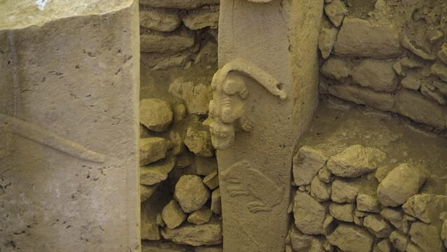 Animal carvings in limestone rocks at G&ouml;bekli Tepe ancient ruins, Turkey