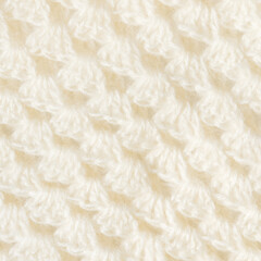 White knitted texture of woolen wool