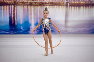 girl competes with a hoop