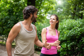 Fototapeta premium Couple running together outdoor