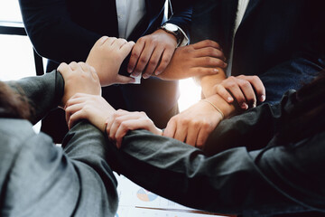 business group people showing unity with their hands together