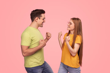 Happy couple celebrating victory together