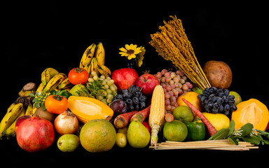 Assortment of Organic fruits on dark banner for healthy eating concept