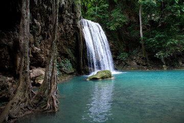 Erawan Waterfall in Kanchanaburi. Amazing turquoise water and wonderful jungle. Ideal place for a...