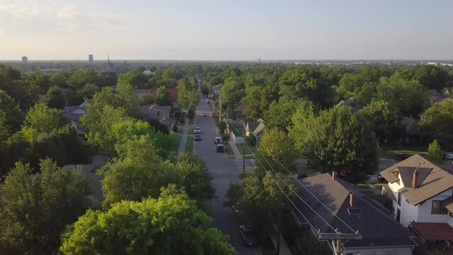 Residential Neighborhood In Tulsa, Oklahoma, USA. Drone Backwards. 