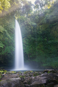 Nung Nung Waterfall at sunrise in Bali © Perry