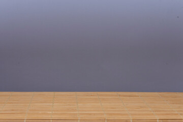 Wooden textured table surface on a neutral background, space for your text or image, copy space.