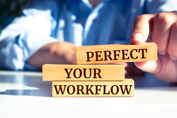 Wooden blocks with words 'Perfect Your Workflow'.