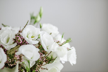 Beautiful bouquet with lisianthus and heather. Place for text. Concept for background, gift, holiday