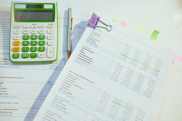 Naklejka na ściany i meble tax time. calculator and documents on table