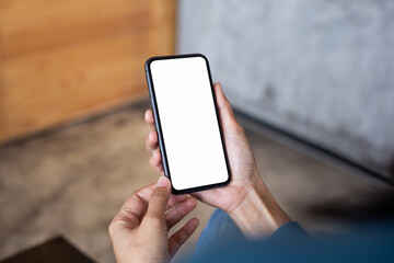 cell phone blank white screen mockup.hand holding texting using mobile on desk at office.background empty space for advertise.work people contact marketing business,technology