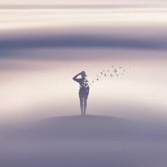 Fototapeta premium Woman soldier in fog. Death, afterlife. Flying birds in misty clouds
