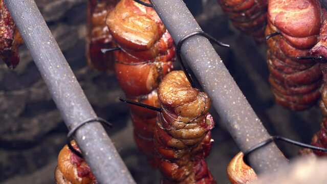 The process of smoking meat at home, smoked pork. Bacon, ham, sausage.
