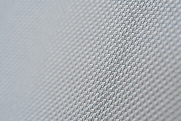 close up macro pattern of knitt fiber fabric syntetic modern furniture material weave grey...