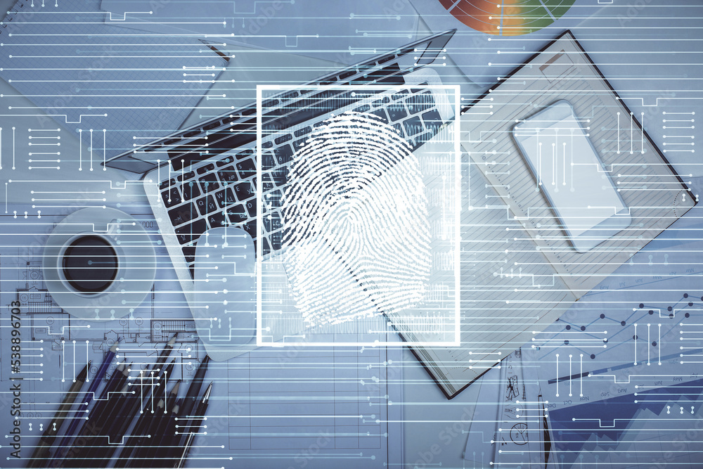 Poster Finger print over computer on the desktop background. Top view. Double exposure. Concept of securitization.