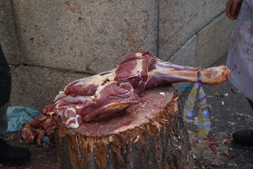 Almaty, Kazakhstan - 10.15.2022 : Preparation of beef meat for sale on the market.