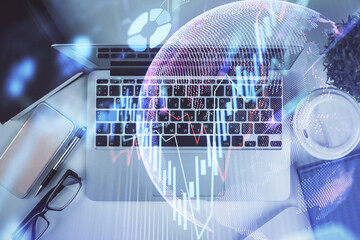 Multi exposure of financial chart drawing over table background with computer. Concept of research. Top view.