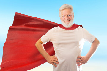 an old man retired superhero dressed in a red superhero cape