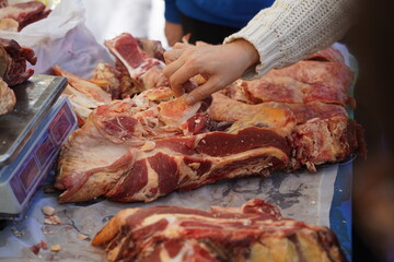 Almaty, Kazakhstan - 10.15.2022 : Sale of beef meat on the market.