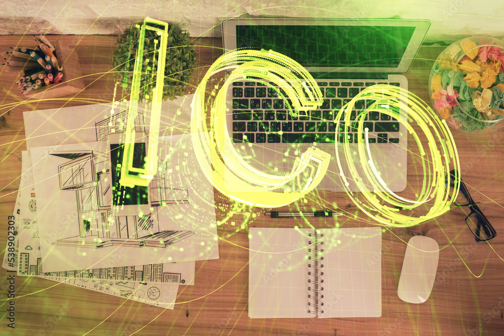 Poster Blockchain theme hologram drawings over computer on the desktop background. Top view. Double exposure.