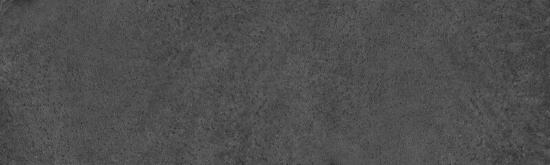 Black textured surface. Gray rough wide texture. Abstract dark grey grunge panoramic background