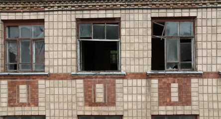 Old abandoned building with broken windows