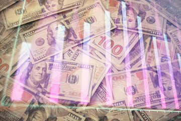 Multi exposure of forex chart drawing over us dollars bill background. Concept of financial success markets.