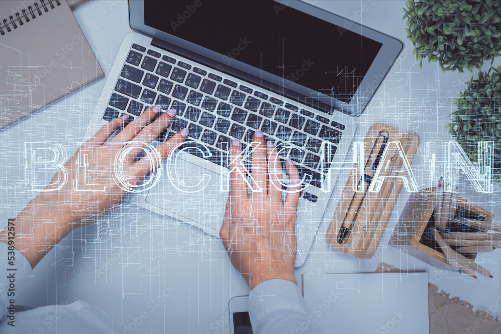 Aufkleber double exposure of woman hands working on computer and blockchain theme hologram drawing. top view. 