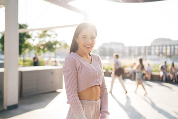 Smiling woman standing on street