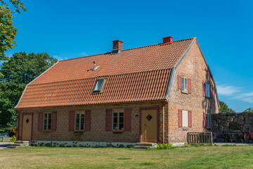 Fototapeta na wymiar A solid beautiful ancient renovated building from bricks in Sweden, Wanas