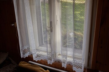 Window of a cozy old wooden house