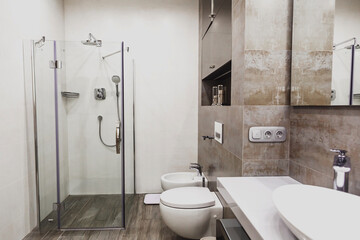 Naklejka na ściany i meble Modern bathroom in white and gray tones with mosaic on wide angle view