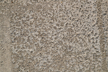 Concrete texture for the background. Abstract colored pattern on a concrete surface as a background. Structure of an old destroyed wall for vintage style.