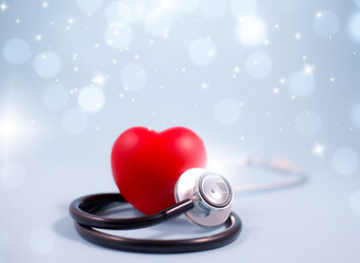 Concept Background stethoscope and red heart with Health insurance, stethoscope and red heart check heart health care, instrument for checking heart on the white background ,isolated, card background.