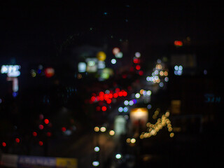 abstract background with defocused bokeh car lights