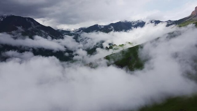 AERIAL: A beautiful mountain landscape in the clouds