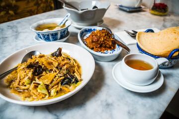 A Peranakan Chinese Malay mixed heritage cuisine meal of various dishes