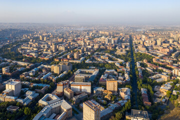 Fototapeta na wymiar Aerial view of central part of Yerevan and Mesrop Mashtots Avenue on sunny day. Armenia.