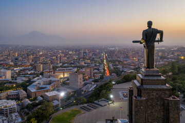 Fototapeta premium View of Mother Armenia Statue and Yerevan in the night, Armenia.