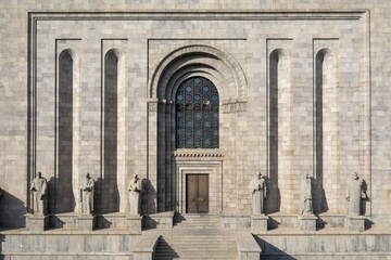 Facade of Matenadaran (museum, repository of manuscripts) on sunny evening. Yerevan, Armenia.