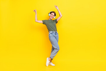 Fototapeta na wymiar Full length photo of adorable glad lady rejoice holiday weekend shopping sale eyes closed empty space isolated on yellow color background