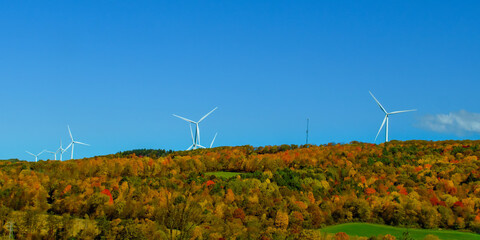 Windmill Turbines line the mountaintop ridge in central NY state.  Trying to offset CO2 emissions...